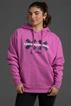 Person wearing a pink hoodie with text on a gray background || Bright Fuchsia