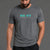 Man wearing a gray t-shirt with 'XXY Athletics' logo on a gray background || Black/Dark Heather Gray/Light Heather Gray