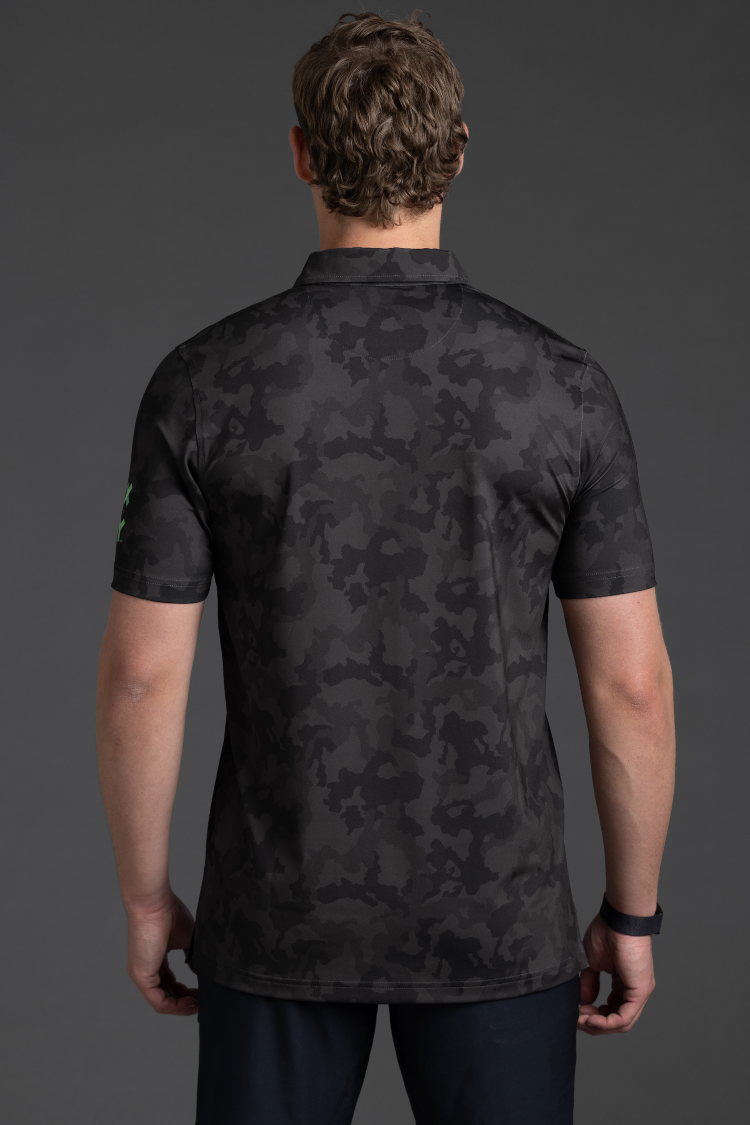 Man wearing a black camouflage patterned shirt on a gray background || Black Camo