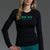 Woman wearing a black long-sleeve shirt with 'XXXY Athletics' logo and teal leggings on a gray background || Black