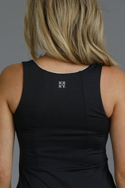 Black tank top with a logo on the back against a gray background || Black