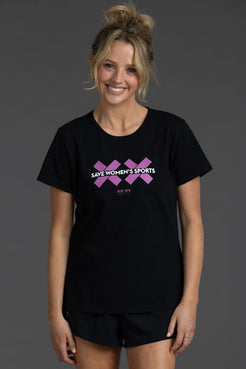 Woman wearing a black t-shirt with pink graphics and text on a gray background || Bright Fuchsia