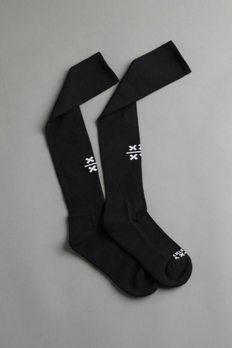 Black socks with a logo on a gray background || Black 