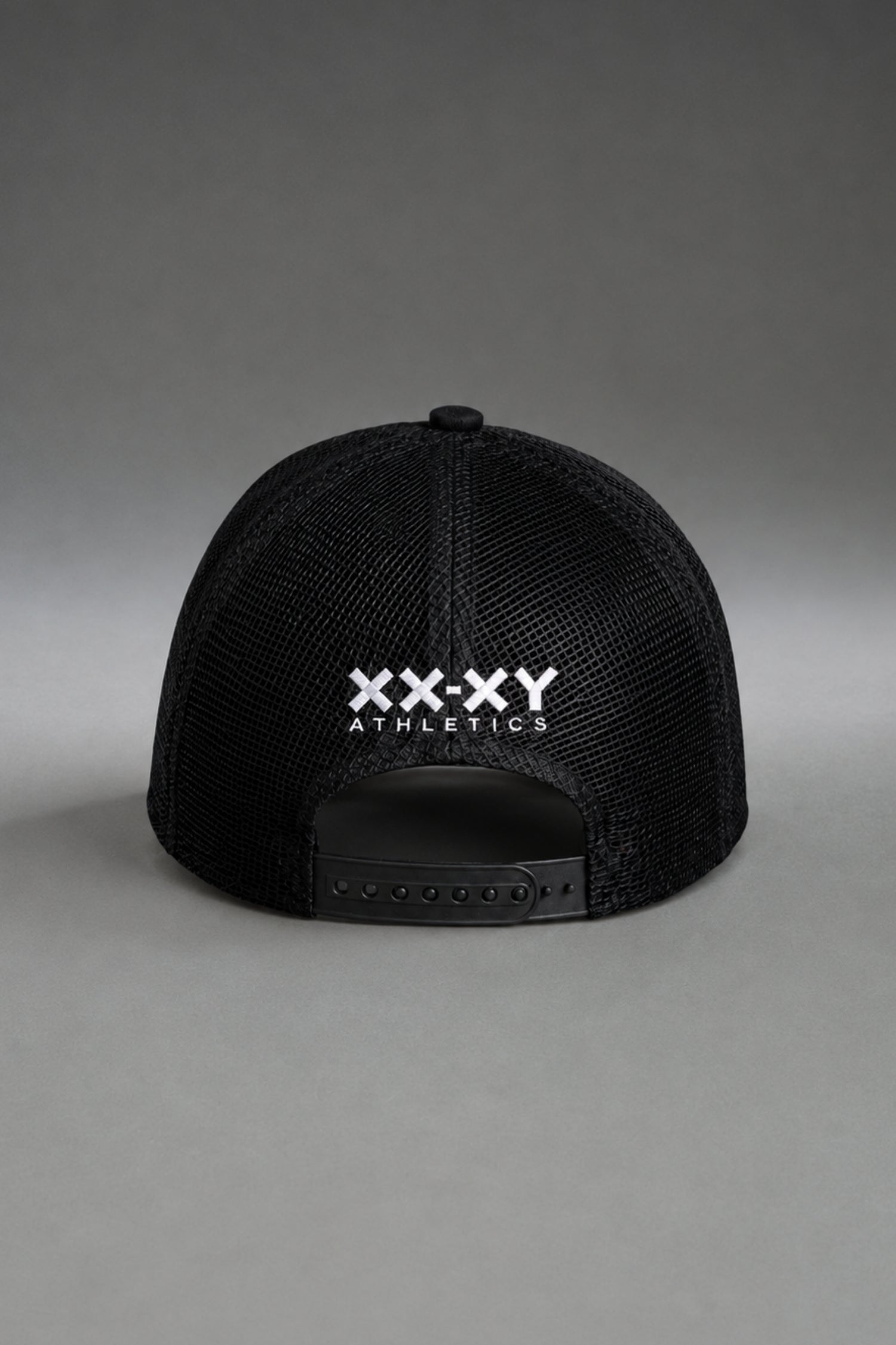 Back of black Nashville Balls mesh trucker hat with white XX-XY Athletics logo