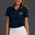 Woman wearing a navy polo shirt with logos and a white skirt || Navy