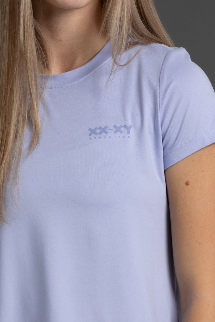 Lavender t-shirt with a logo on a person wearing it