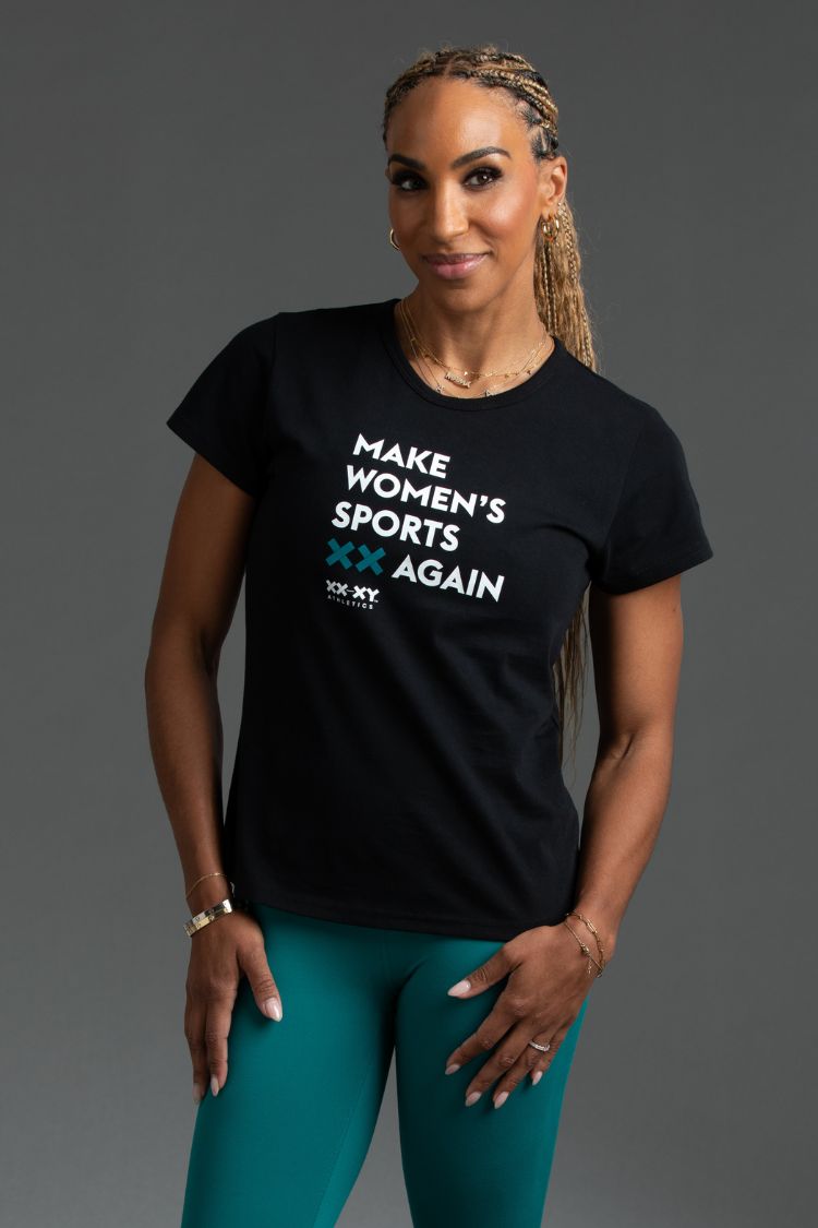Woman wearing a black t-shirt with text on a gray background || Black