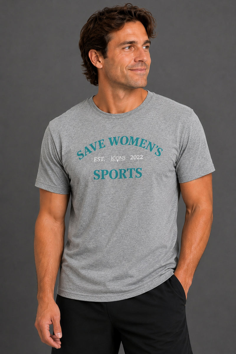 A man wearing a heather gray t-shirt with teal and white text that reads 'SAVE WOMEN'S SPORTS EST. 2025' on the chest, posed against a dark gray studio background. || Heather Gray