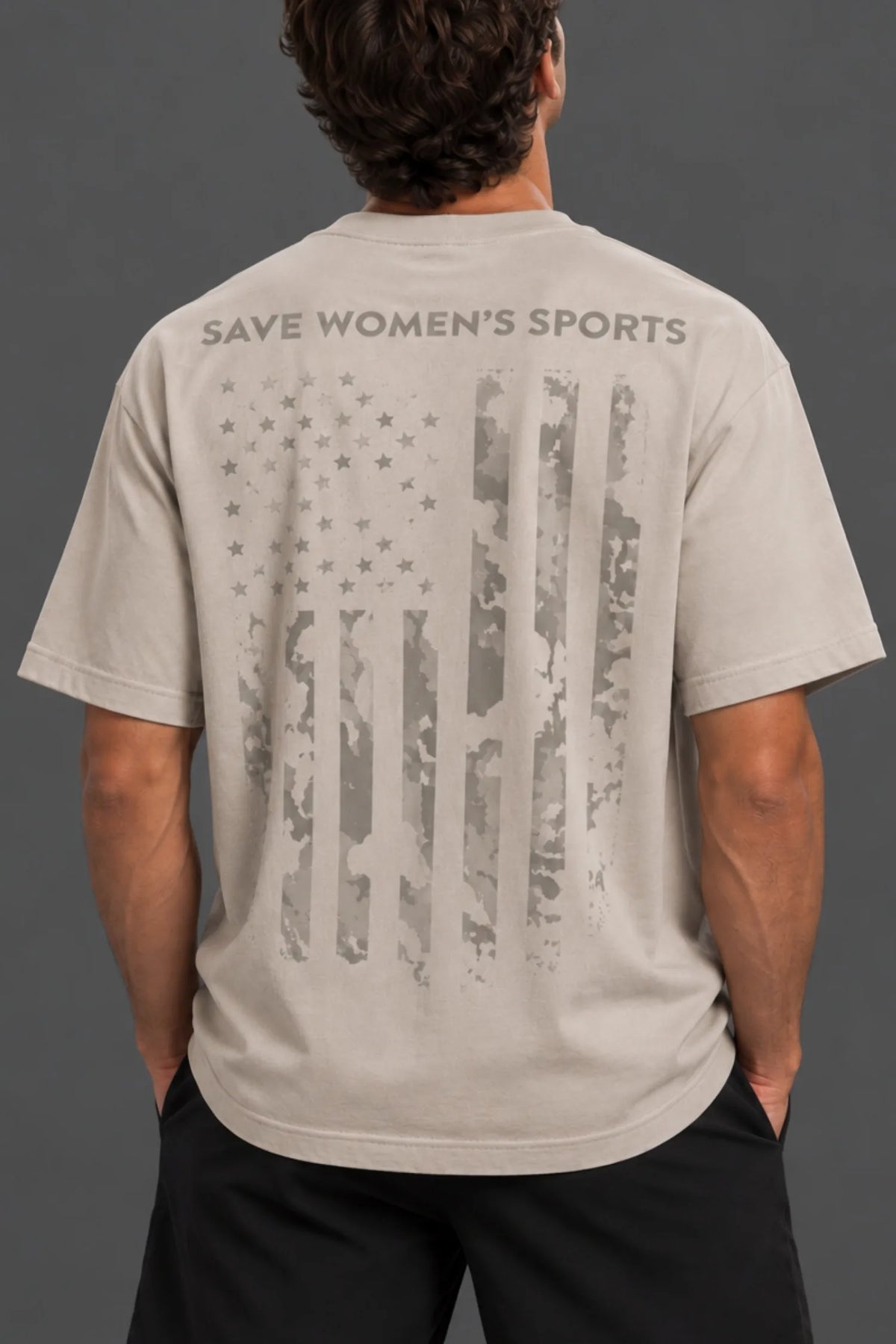 Men’s stone Save Women’s Sports T-shirt featuring a distressed American flag graphic on the back. || Dune