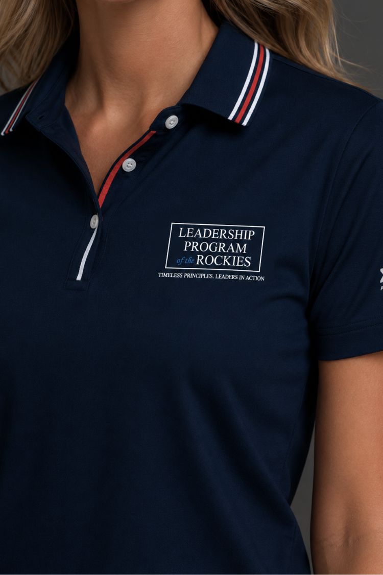 Navy blue polo shirt with a logo on the chest