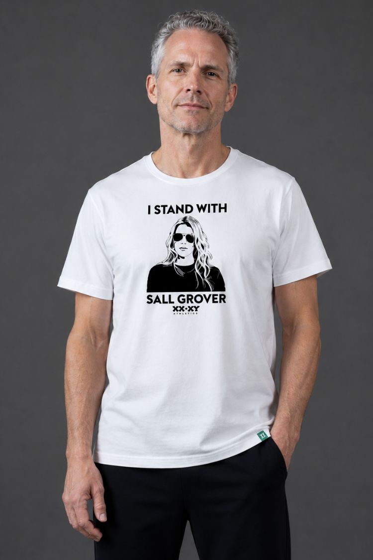 Man wearing a white t-shirt with a graphic and text on a gray background || White