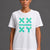 A woman modeling a white short-sleeve athletic T-shirt with a teal geometric logo and the word 'ATHLETICS' on the chest, paired with light gray sweatpants against a dark gray studio background. || White