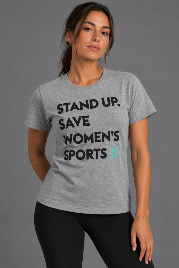 Woman wearing the gray Stand Up Save Women’s Sports graphic tee with black leggings || Heather Gray