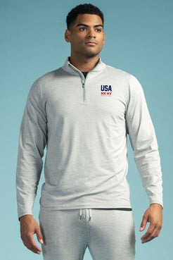 Man wearing a gray USA tracksuit against a light blue background || Light Heather Gray - 1
