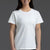 Woman wearing a plain white t-shirt against a gray background || White