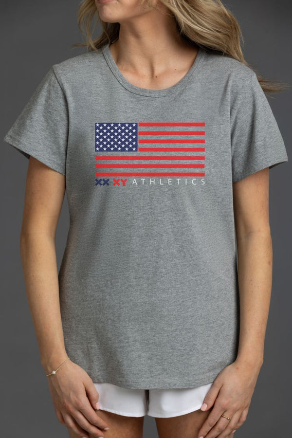 Person wearing a gray t-shirt with an American flag design and 'XX Athletics' text. || Heather Gray