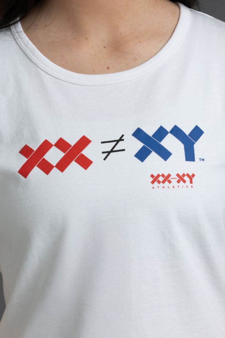 White t-shirt with red, black, and blue logo on a person wearing it. || White