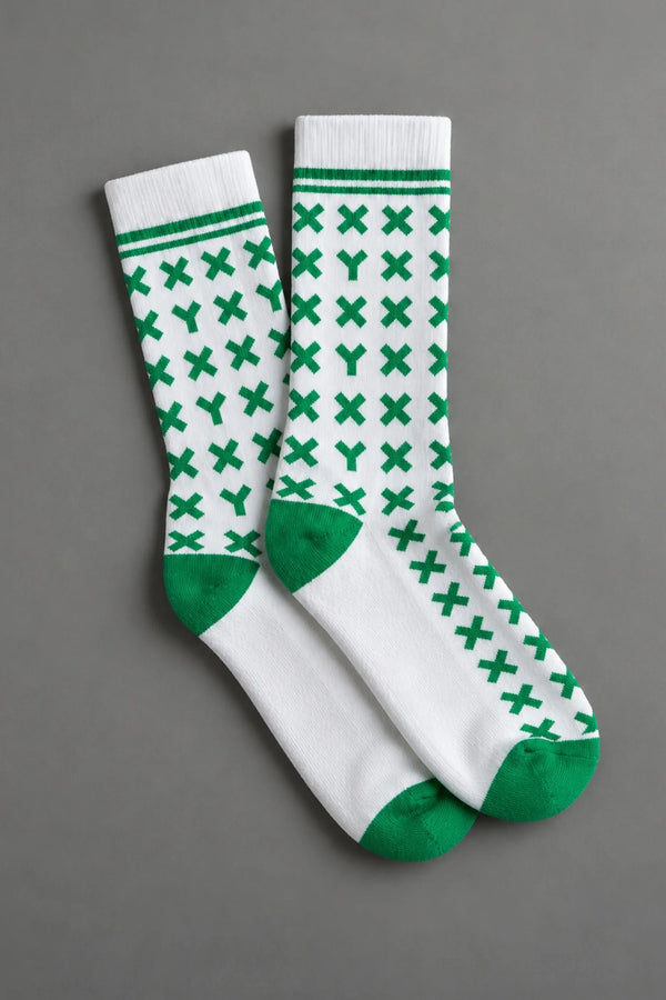 Pair of white socks with green pattern on a gray background || kelly green