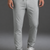 Person wearing gray sweatpants and white sneakers on a gray background || Light Heather Gray - 1