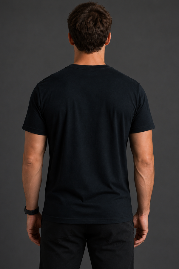 Person wearing a black t-shirt and pants against a dark gray background || Black