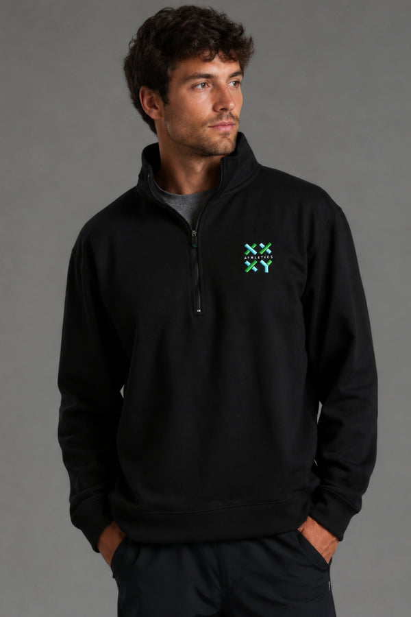Person wearing a black pullover with a logo on a gray background || Black