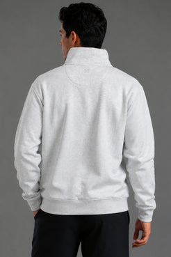 Male model wearing a light gray XX-XY Athletics quarter-zip fleece, shown in a back shot highlighting the back of the fleece. || Light Heather Gray