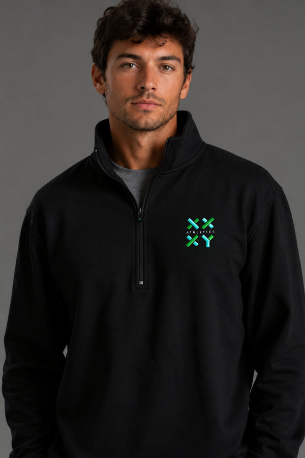 Person wearing a black pullover with a logo on a gray background || Black