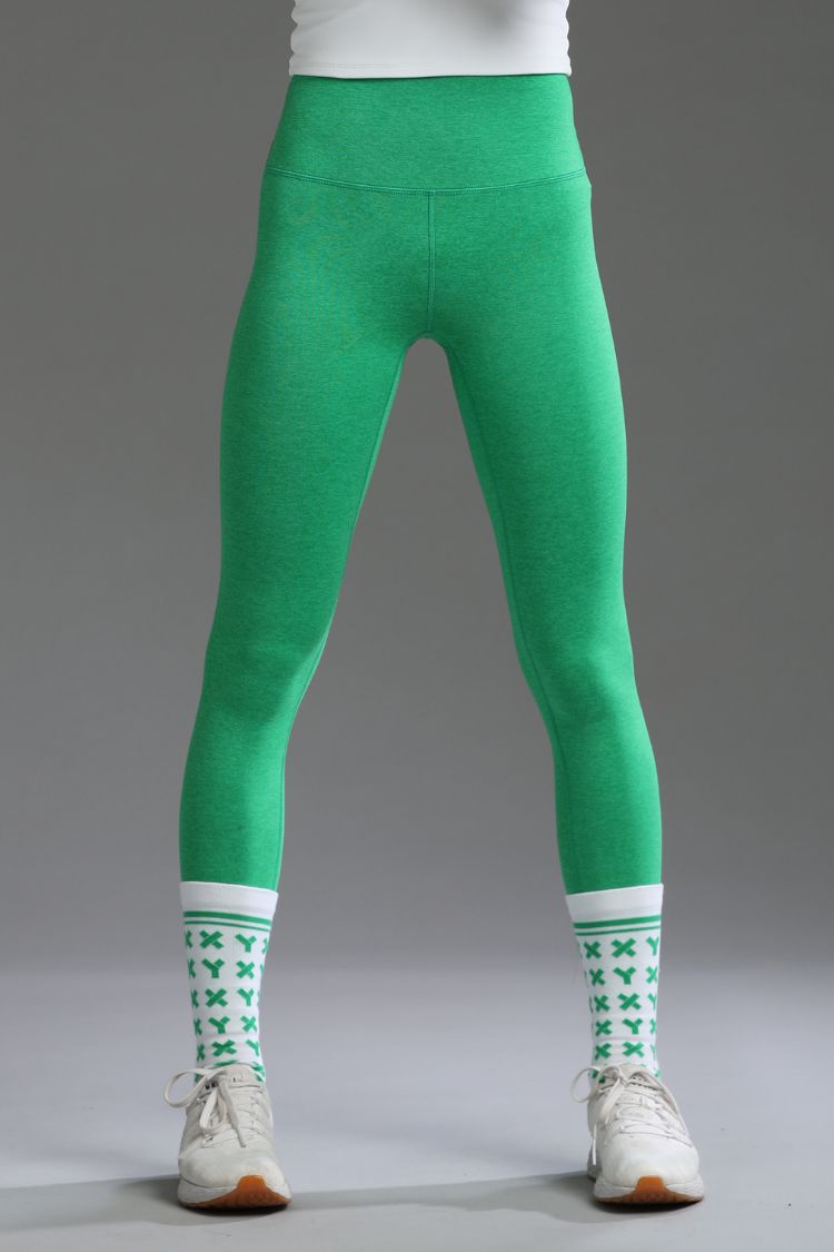 Green leggings worn by women on a gray background || Kelly Green