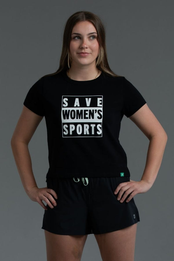 Woman wearing a black t-shirt with 'SAVE WOMEN'S SPORTS' text on a gray background || Black