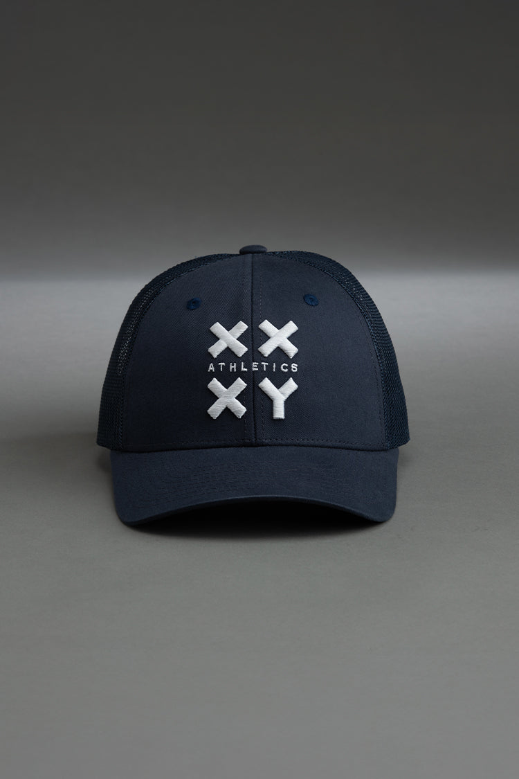 Navy blue cap with white logo on a gray background || navy with white logo