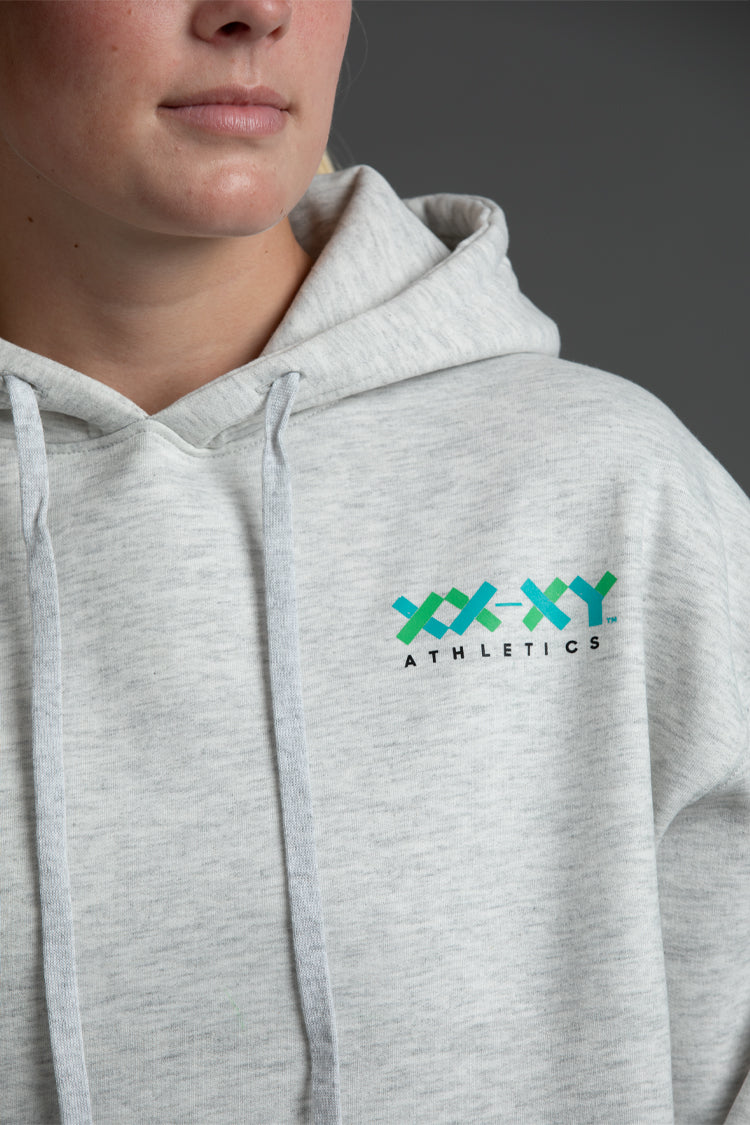 Gray hoodie with 'XXXY Athletics' logo on a dark background || Light Heather Gray