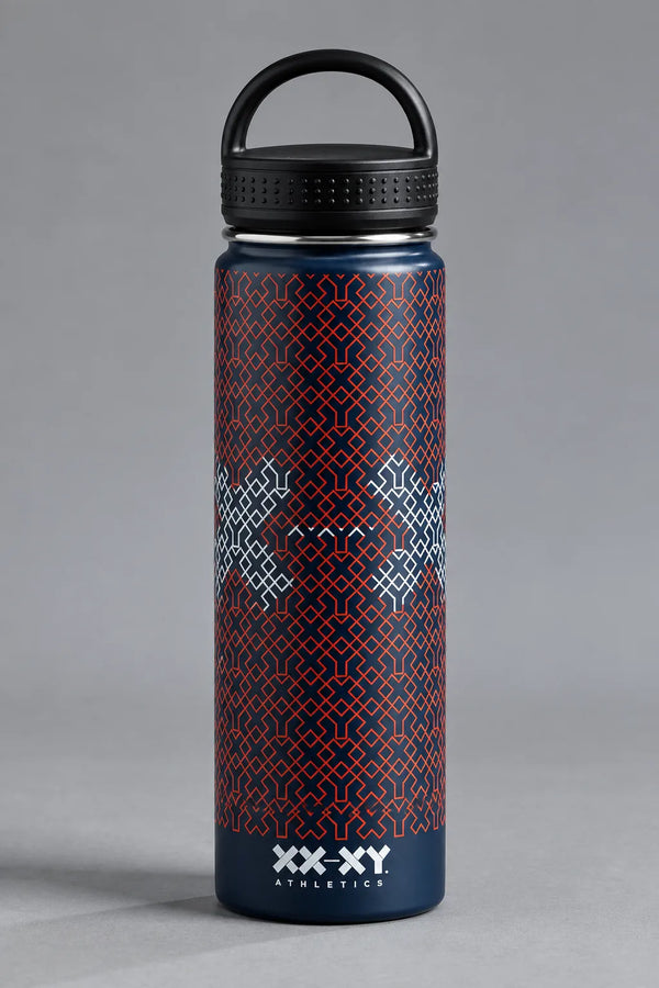 A 32 oz insulated stainless steel water bottle by XX-XY, featuring a dark navy blue body with a red geometric pattern and white geometric accents, topped with a black lid and carrying loop, set against a neutral gray background. || Navy Patriotic