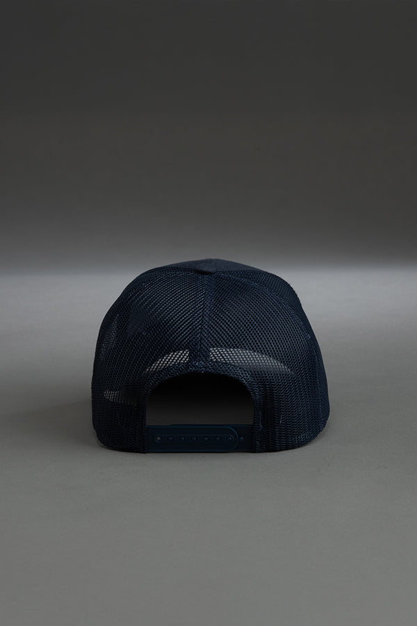 Navy blue cap on a gray background || navy with red & white logo