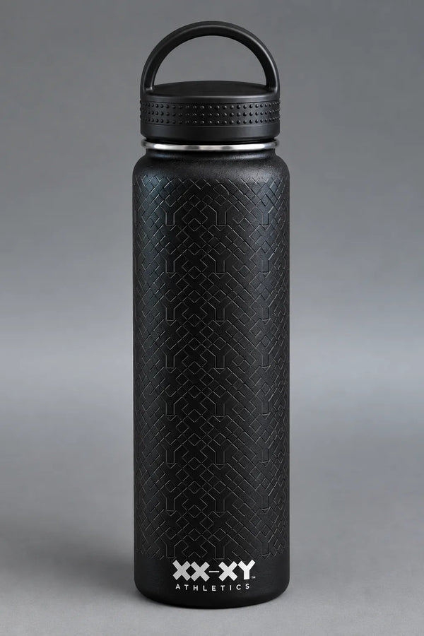 Black XX-XY Athletics water bottle with embossed geometric texture and loop handle lid on gray background || Black