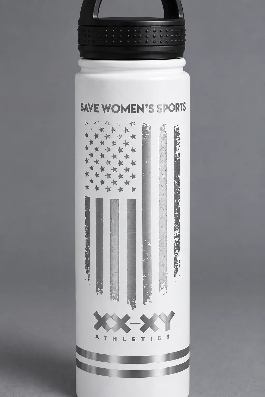 Close-up of the metallic Save Women’s Sports flag design on the white XX-XY Athletics water bottle. || White