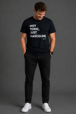 Man wearing a black t-shirt with text on a gray background || Black