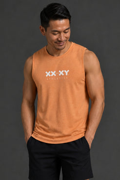 Man wearing an orange tank top with a logo on a dark background || Light Orange