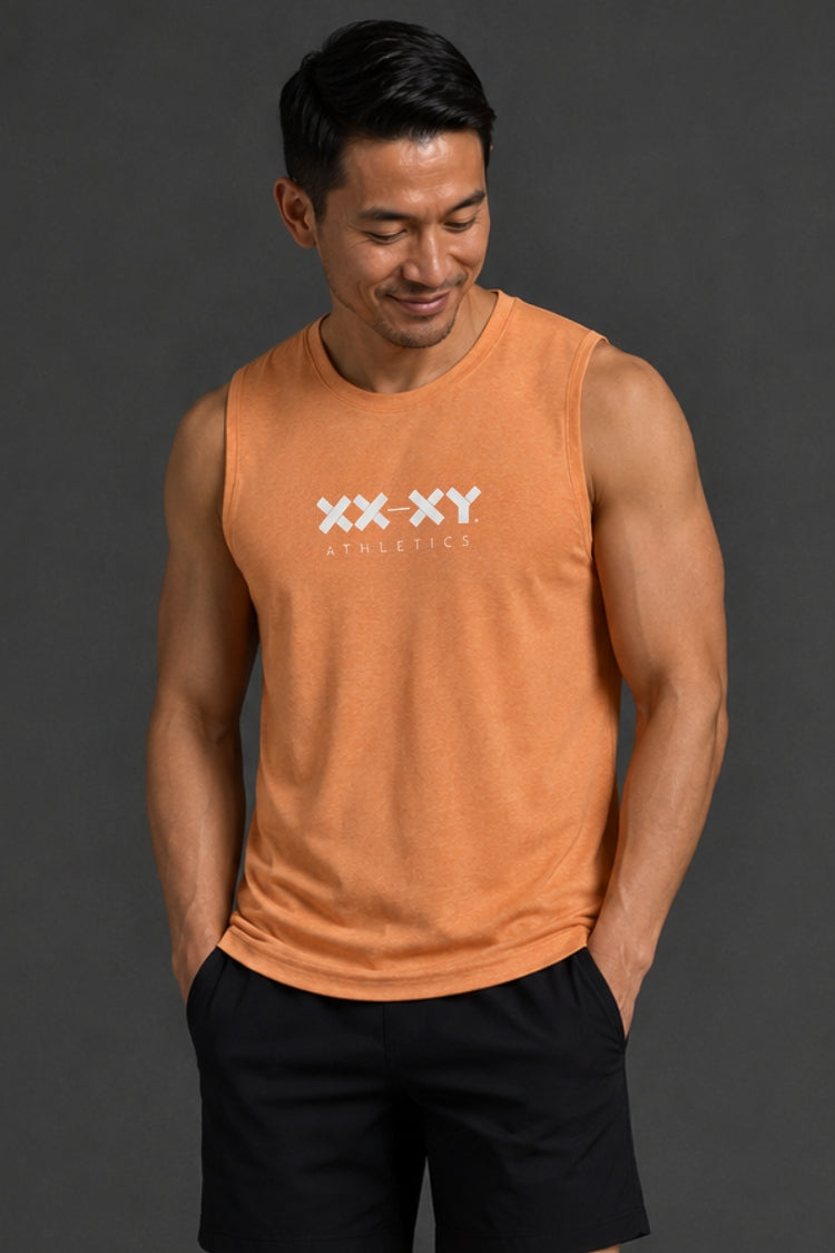 Man wearing an orange tank top with a logo on a dark background || Light Orange