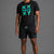 A man modeling a black athletic t-shirt and matching shorts set. The t-shirt features a teal and green graphic on the chest with the letters 'XXXY' arranged in a grid. || Black