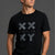 Person wearing a black t-shirt with a logo and text on a gray background || Black Tonal
