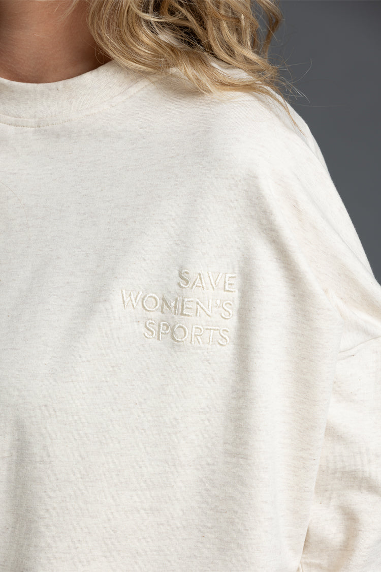White sweatshirt with 'Save Women's Sports' text on a gray background || Oatmeal Heather