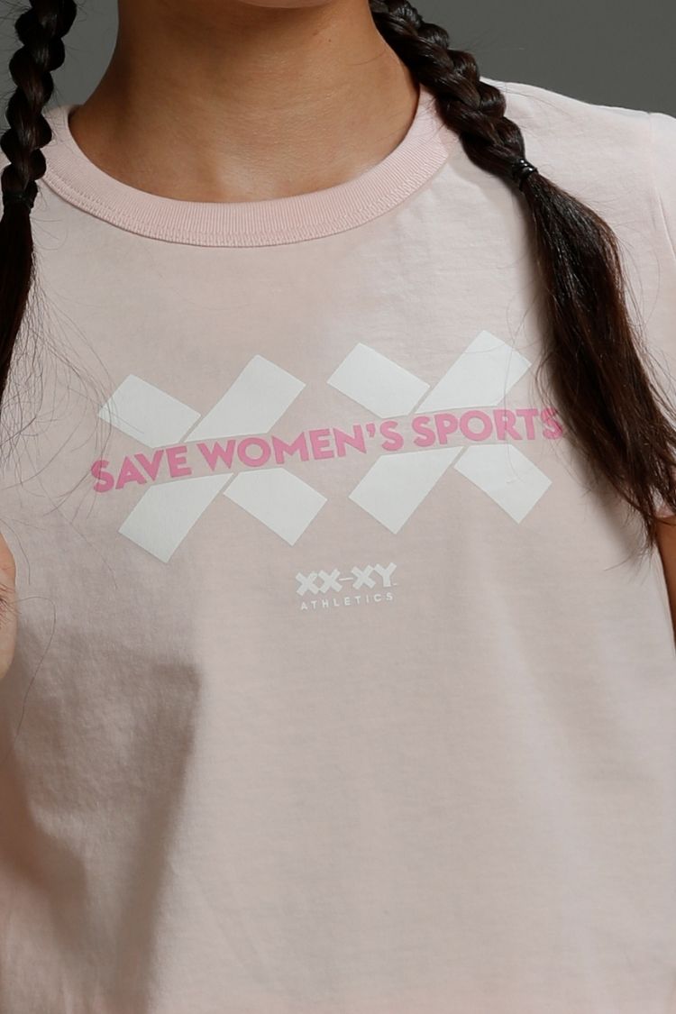 Pink t-shirt with 'Save Women's Sports' text and logo on a person wearing it. || Light Pink