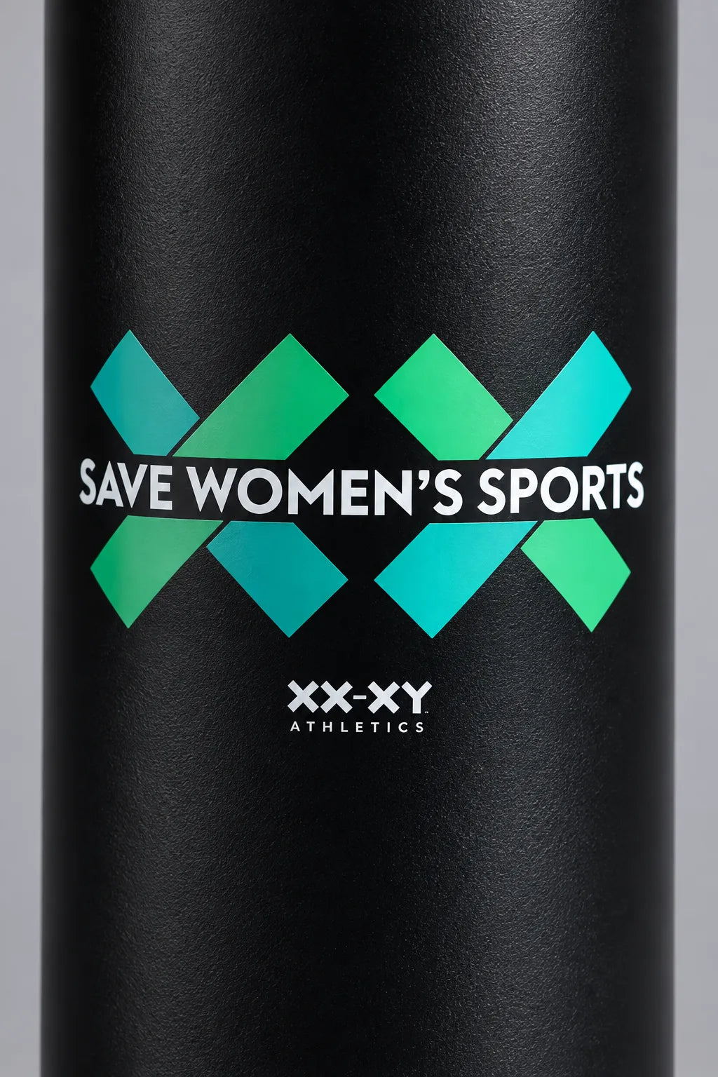 Black XX-XY Athletics Save Women’s Sports water bottle with teal and green graphic on a gray background. || Black