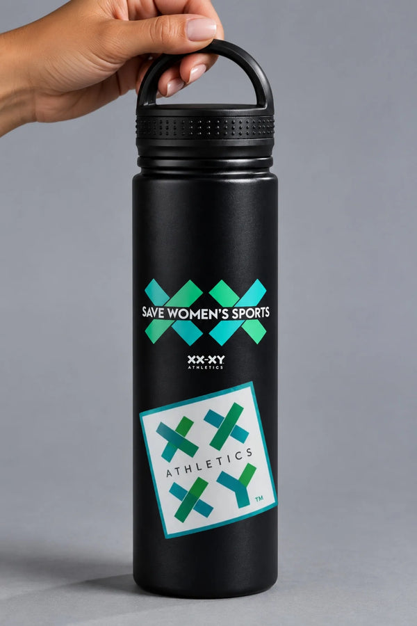 Black XX-XY Athletics Save Women’s Sports water bottle held by the loop handle with logo sticker below the graphic. || Black