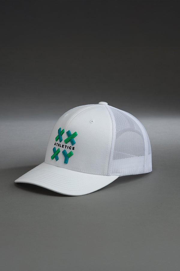 White baseball cap with green logo on a gray background || white with color logo