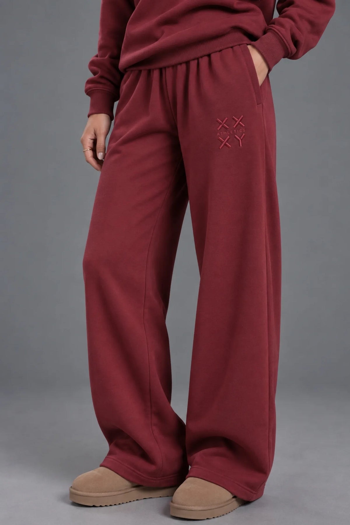 Burgundy XX-XY Athletics wide-leg sweatpants with side pockets and tonal thigh embroidery. || Red Wine
